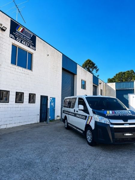Prestige Automotive building and van